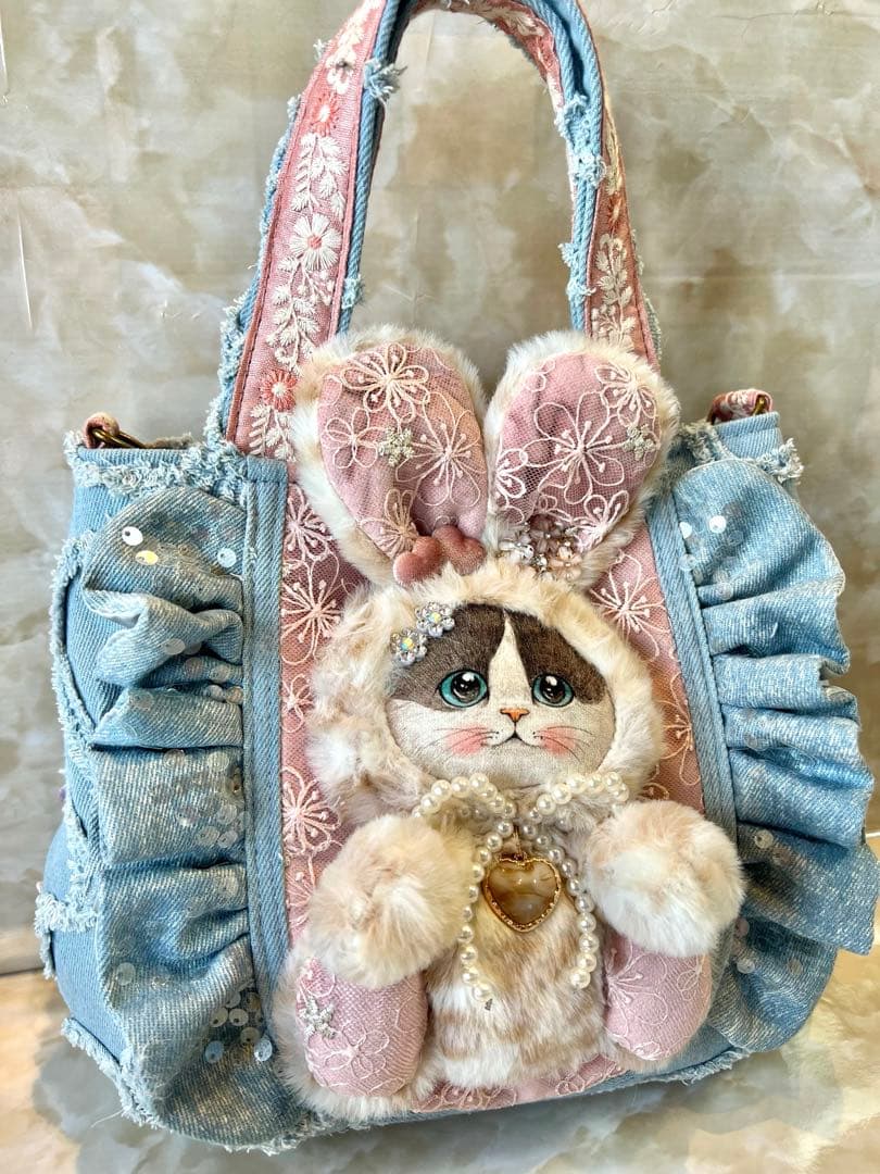 コヤンイサムチョン　ぽってり可愛い　ハートフリンジとフリルのデニムバッグ