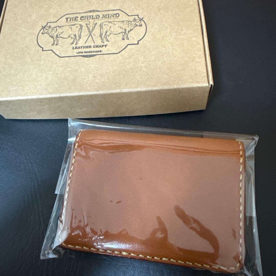 THE CHILD MIND レザーケース 生成り　日光浴済み