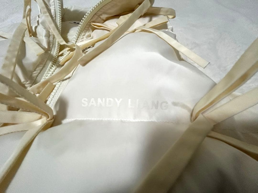 新品未使用SANDY LIANGリボン付きホワイトダウンベスト