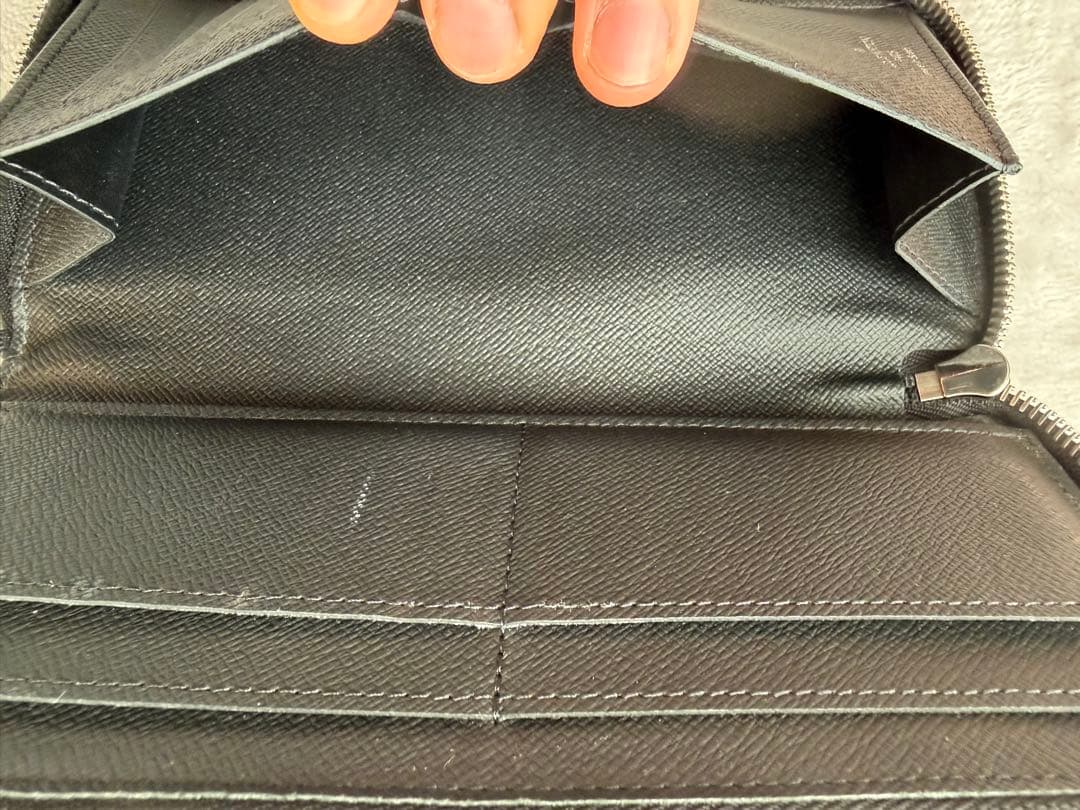 ルイヴィトンM30569 タイガ ジッピーウォレットヴェルティカル 長財布