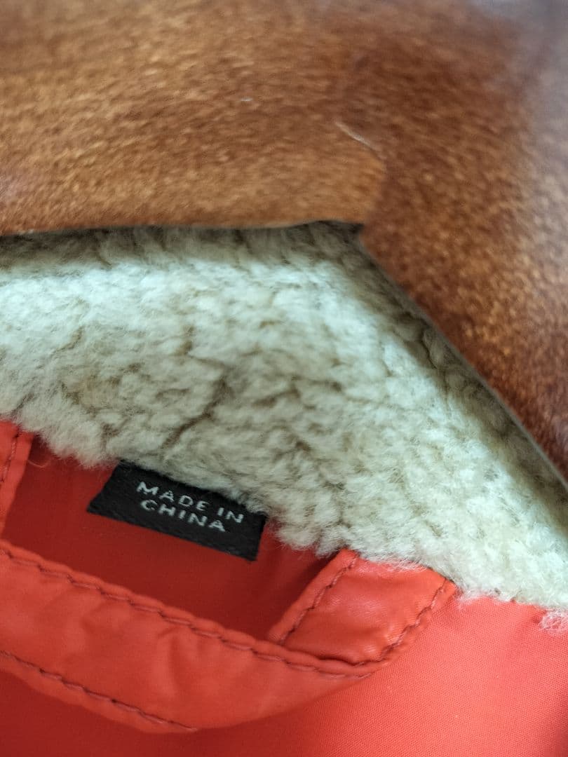 【最終価格】コーチ　ダウンジャケット　オレンジ