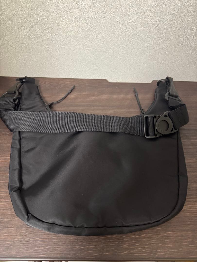 バッグ meltum NYLON CROSSBODY BAG