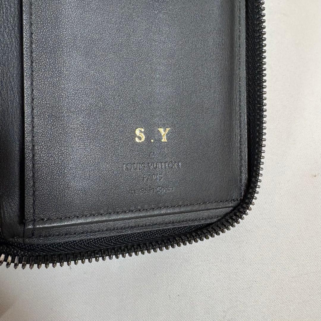 ルイヴィトン モノグラム アンプラント ヴェルティカル 長財布 M69047