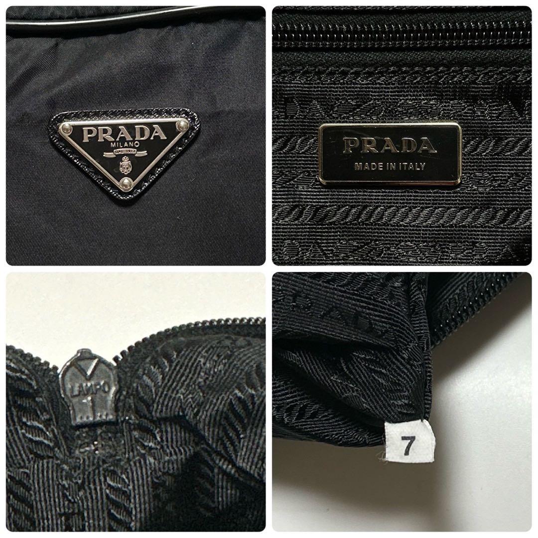 u35【近年モデル】保存袋付　プラダ　サフィアーノ　黒　南京錠　ハンドバッグ.