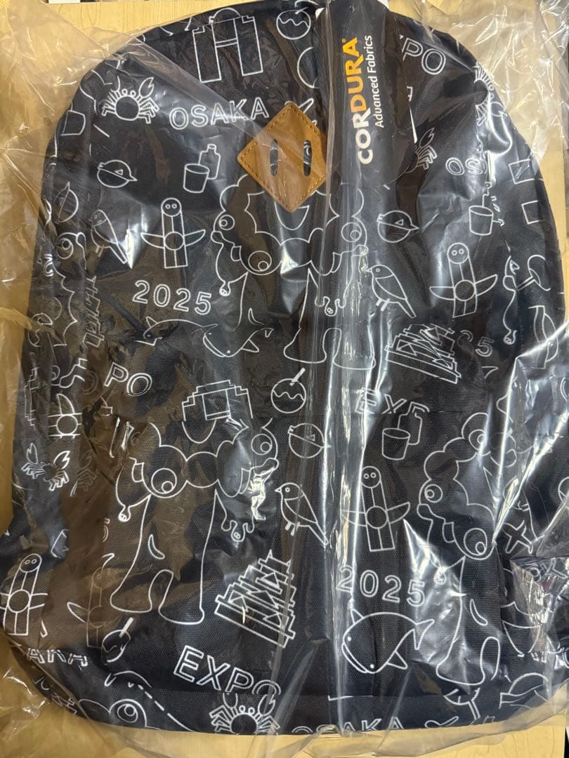 【最安値☆】大阪関西万博　ミャクミャク　リュックサック　総柄　ネオン柄