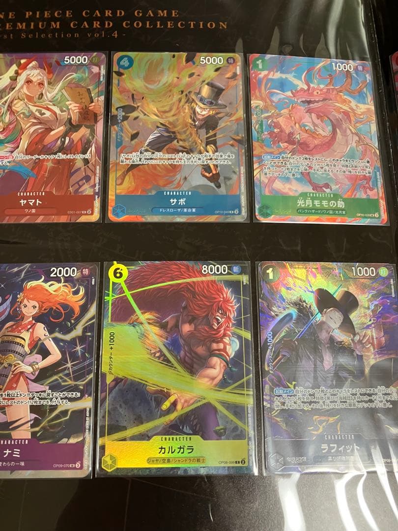 ワンピースカード　プレミアムコレクション等7冊未開封プロモ付25周年REDリーダ