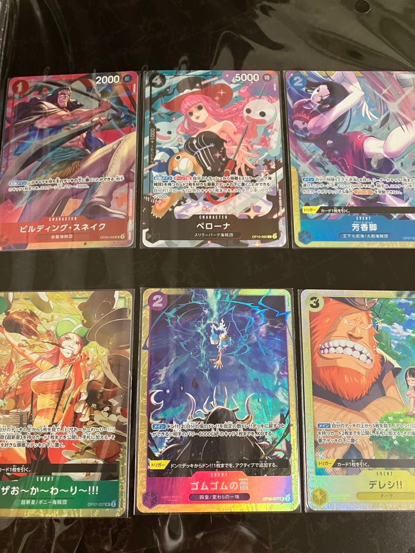 ワンピースカード　プレミアムコレクション等7冊未開封プロモ付25周年REDリーダ