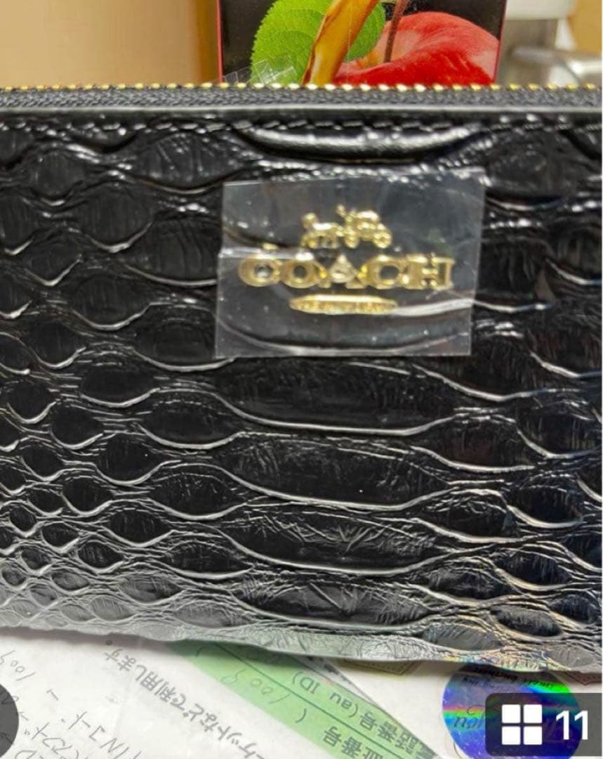 新品未使用品コーチエンボスドスネークレザー長財布【ブラック黒】メンズ　レディース