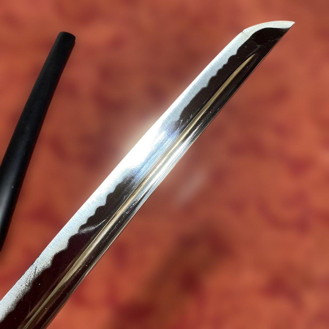 高級居合刀 黒柄 蓮根輪切透し丸鍔 黒呂鞘