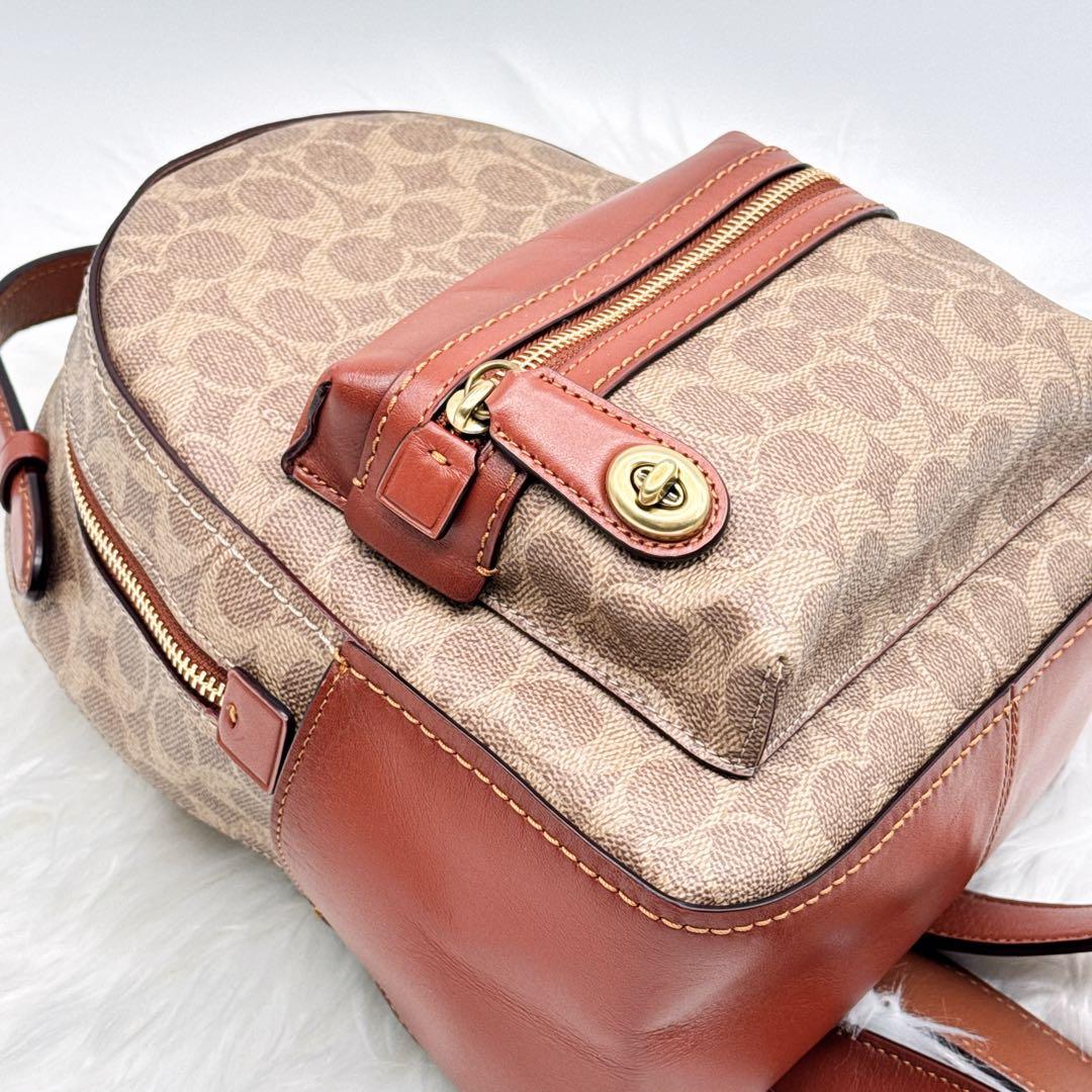 美品✨ COACH PVC レザー ターンロック シグネチャーミニリュック