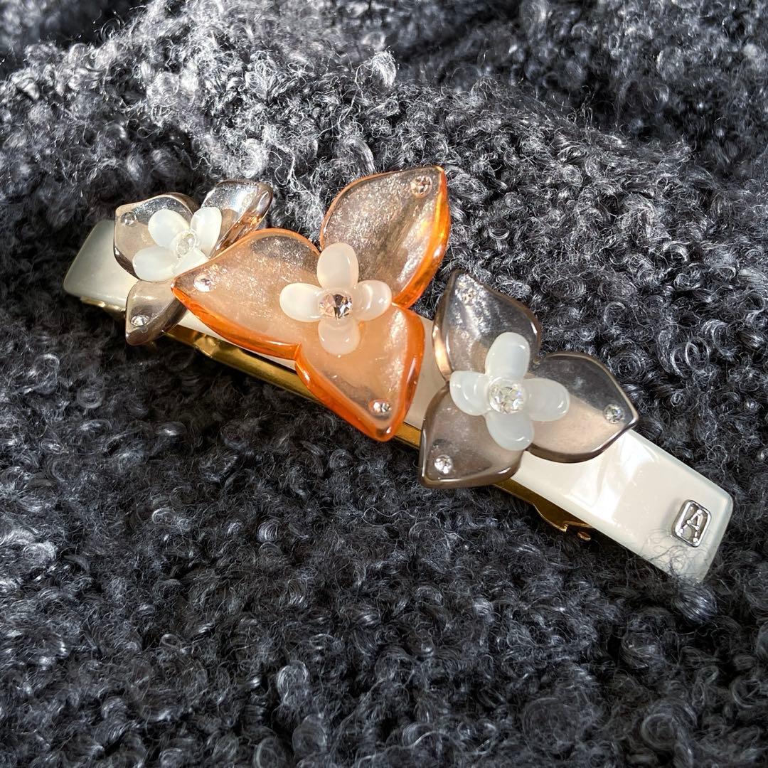 アレクサンドルドゥパリ フラワー バレッタオレンジ クリア 透明 夏ヘアアクセ