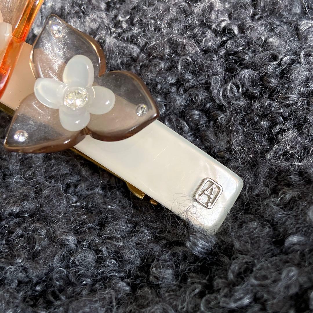 アレクサンドルドゥパリ フラワー バレッタオレンジ クリア 透明 夏ヘアアクセ