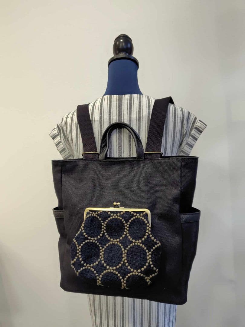 ミナペルホネン/タンバリンネイビー×カーキがま口ポケット/A4トートリュック